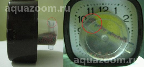 Автокормушка для рыб: контейнер с гранулами корма крепится к стрелке часов